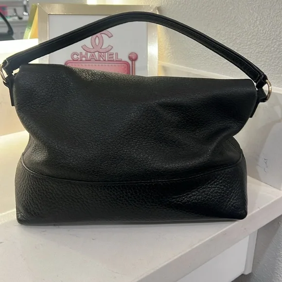 Kate spade everyday purse black leather with removable strap.